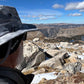 Back view of skully and sun hat overlooking view